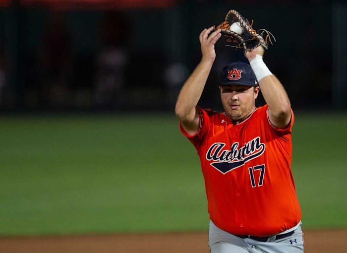 Auburn Tigers infielder Sonny DiChiara (17) catches a fly ball during the NCAA regional baseball tournament at Plainsman Park in Auburn, Ala., on Saturday, June 4, 2022. Auburn Tigers defeated Florida State Seminoles 21-7.